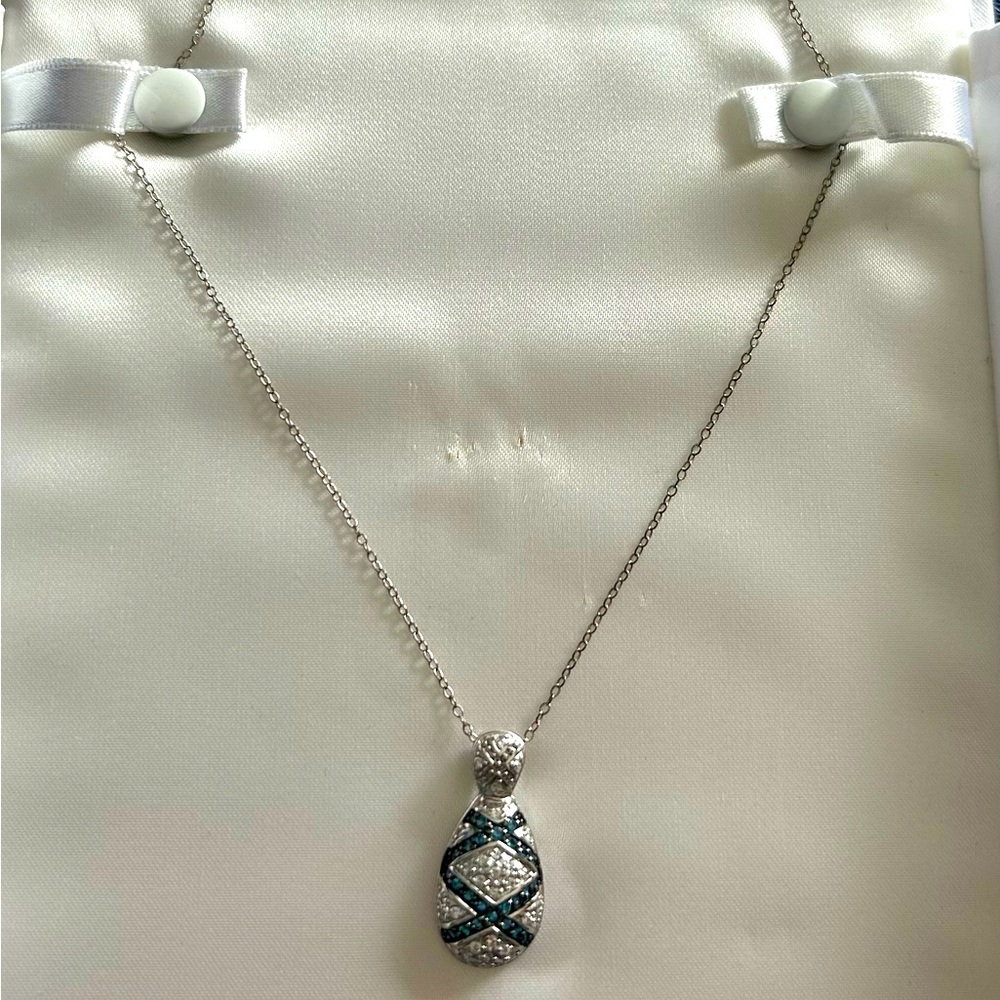 Diamond and sapphire necklace still in box
